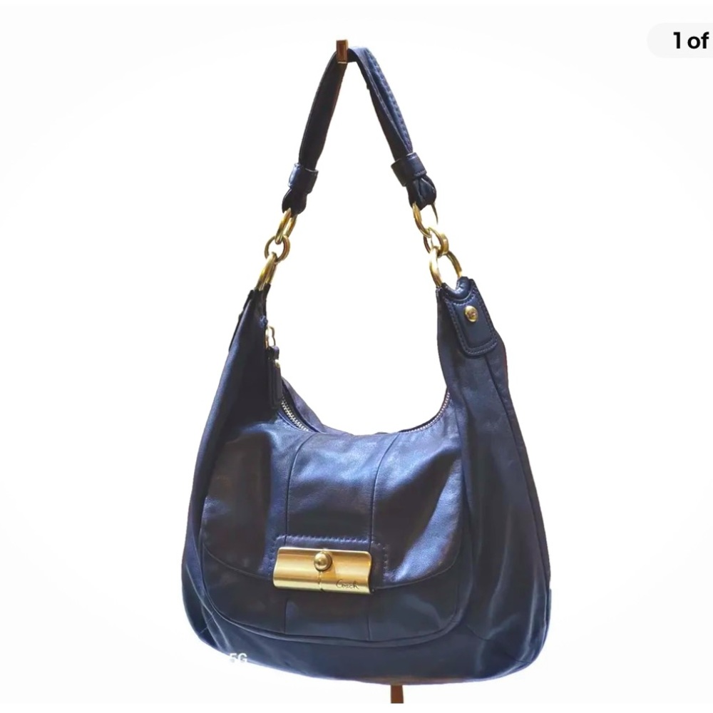 Coach hobo shoulder bag with longer strap.  Navy blue. Excellent condition!